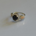 Серебряное кольцо с золотыми пластинками