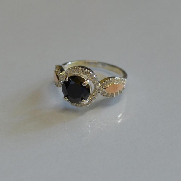 Серебряное кольцо с золотыми пластинками