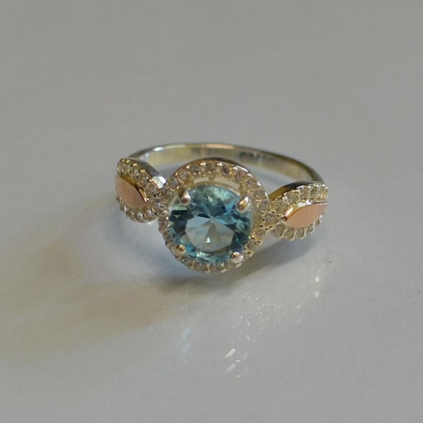 Серебряное кольцо с золотыми пластинками