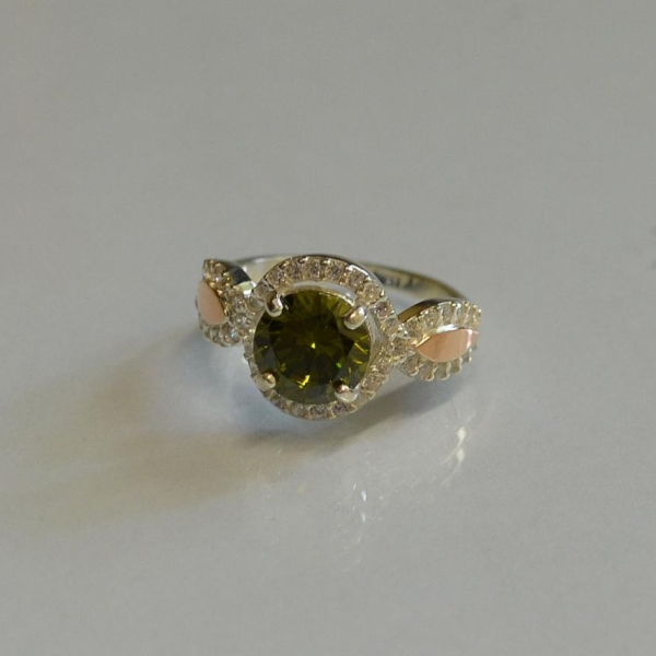 Серебряное кольцо с золотыми пластинками