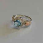 Серебряное кольцо с золотыми пластинками