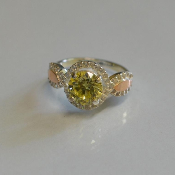 Серебряное кольцо с золотыми пластинками