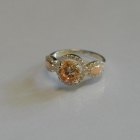 Серебряное кольцо с золотыми пластинками