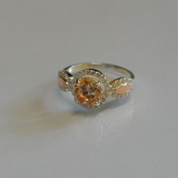 Серебряное кольцо с золотыми пластинками