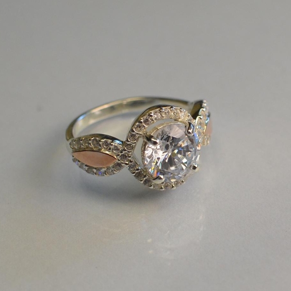 Серебряное кольцо с золотыми пластинками