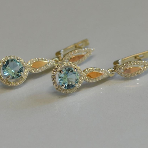 Срібні сережки з золотими пластинками