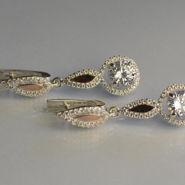 Срібні сережки з золотими пластинками