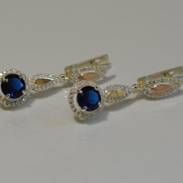 Срібні сережки з золотими пластинками