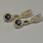 Срібні сережки з золотими пластинками