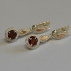 Срібні сережки з золотими пластинками