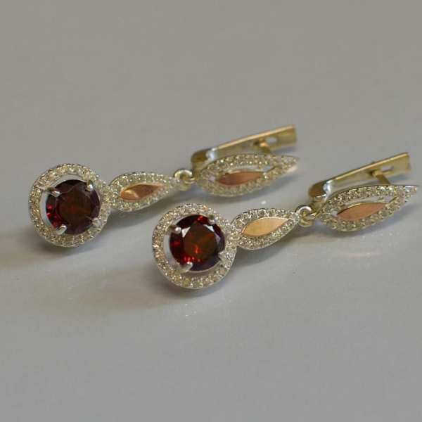 Срібні сережки з золотими пластинками