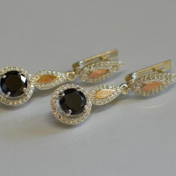 Срібні сережки з золотими пластинками