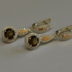 Срібні сережки з золотими пластинками