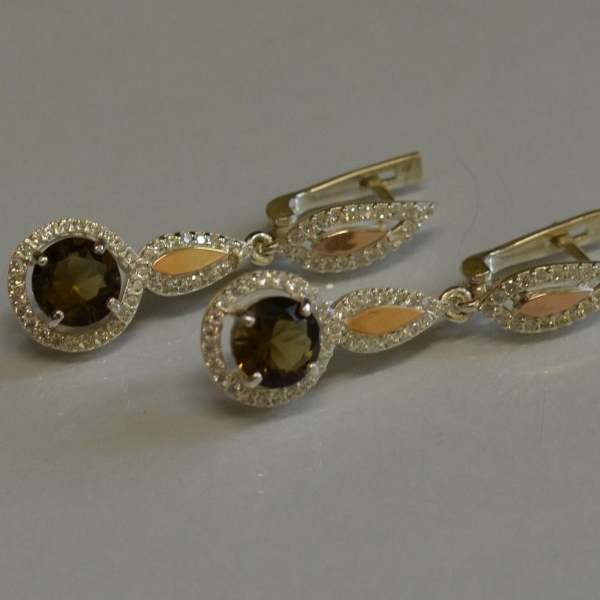 Срібні сережки з золотими пластинками