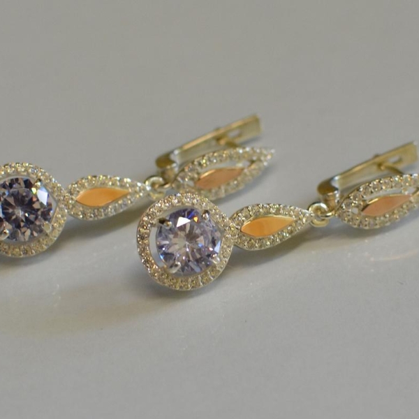 Срібні сережки з золотими пластинками