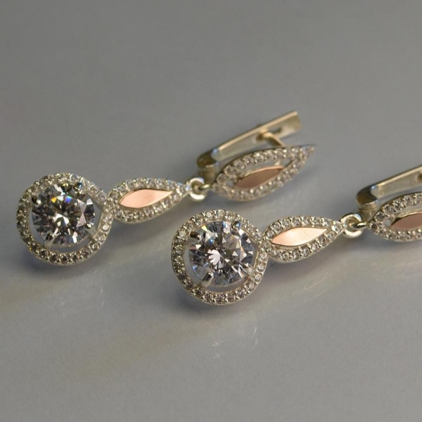 Срібні сережки з золотими пластинками