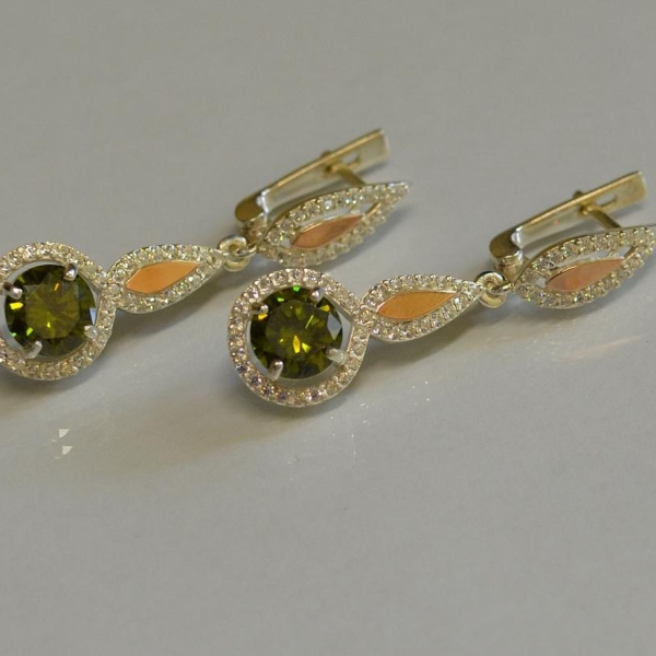 Срібні сережки з золотими пластинками