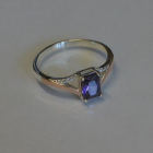 Срібна каблучка з золотими пластинами і фіанітами