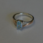 Срібна каблучка з золотими пластинами і фіанітами