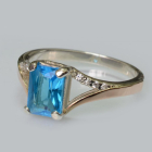 Срібна каблучка з золотими пластинами і фіанітами