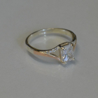 Срібна каблучка з золотими пластинами і фіанітами