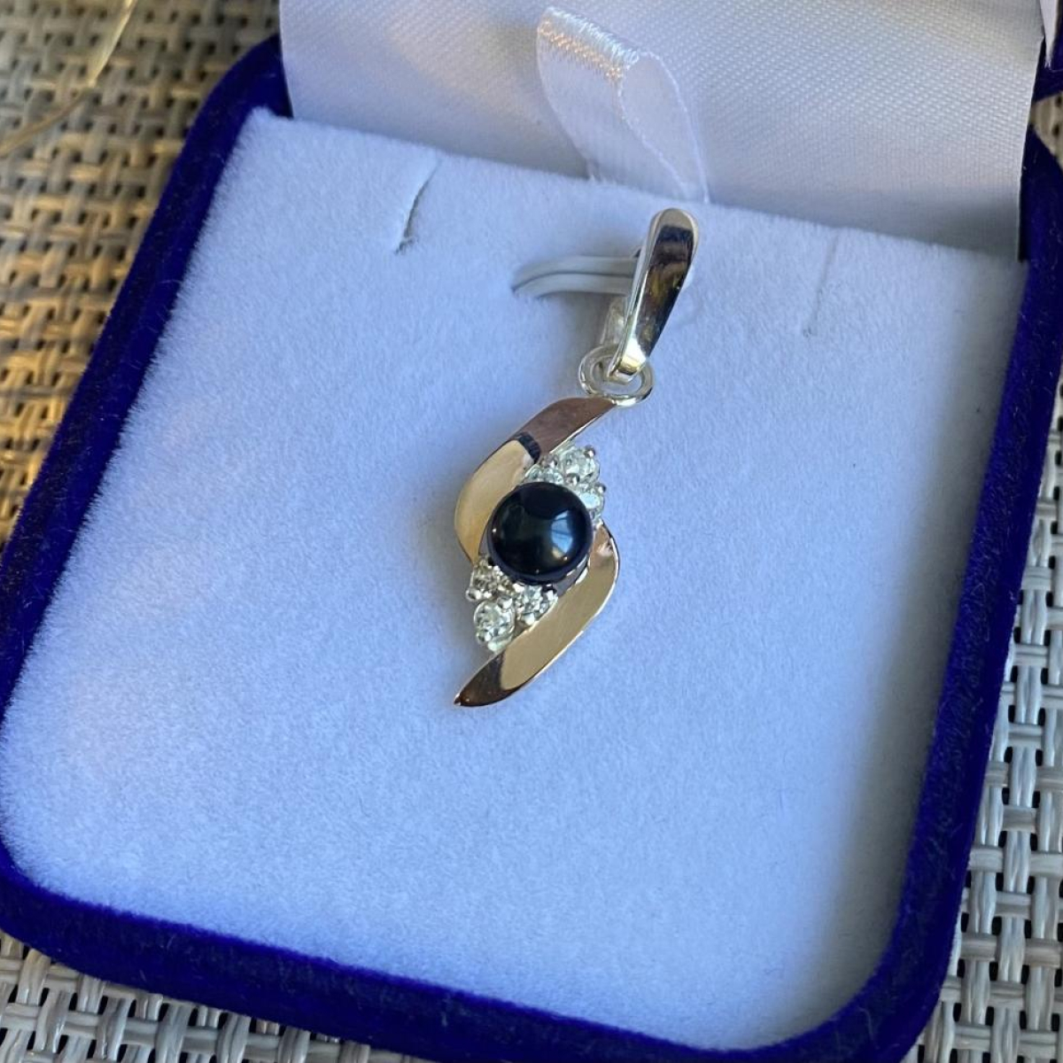 Серебряная подвеска с золотими вставками