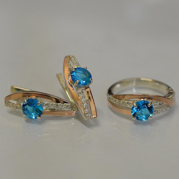 Серебряный набор с золотыми вставками