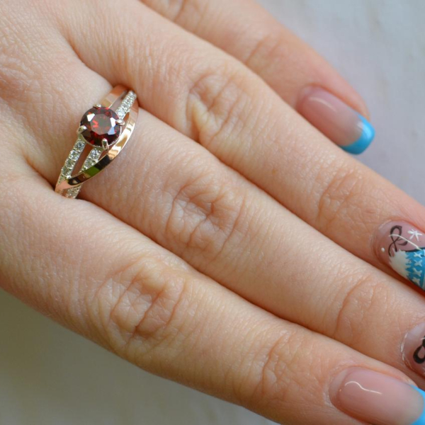 Срібне кільце з золотими вставками