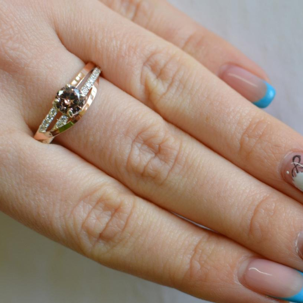 Срібне кільце з золотими вставками