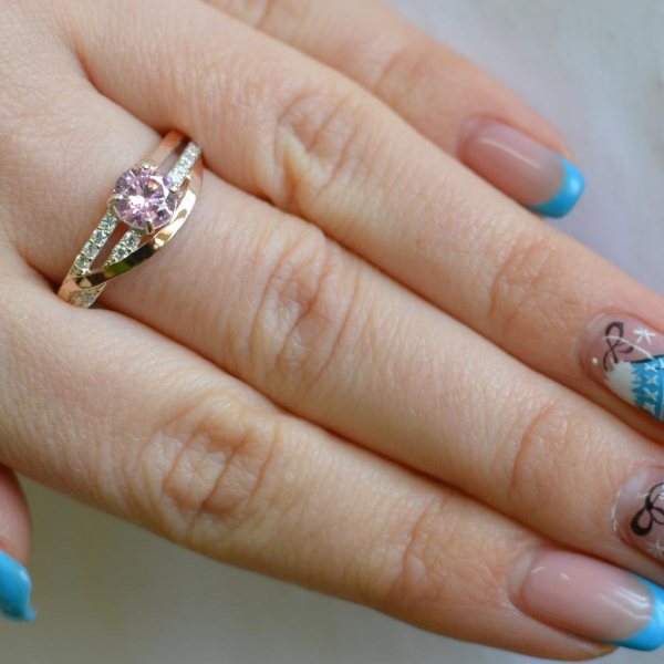 Срібне кільце з золотими вставками