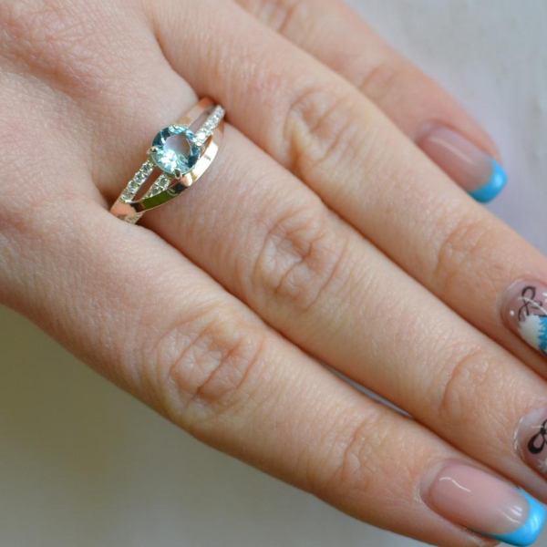 Срібне кільце з золотими вставками