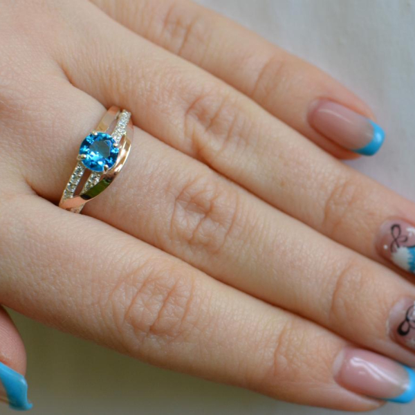 Срібне кільце з золотими вставками