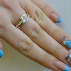 Срібне кільце з золотими вставками