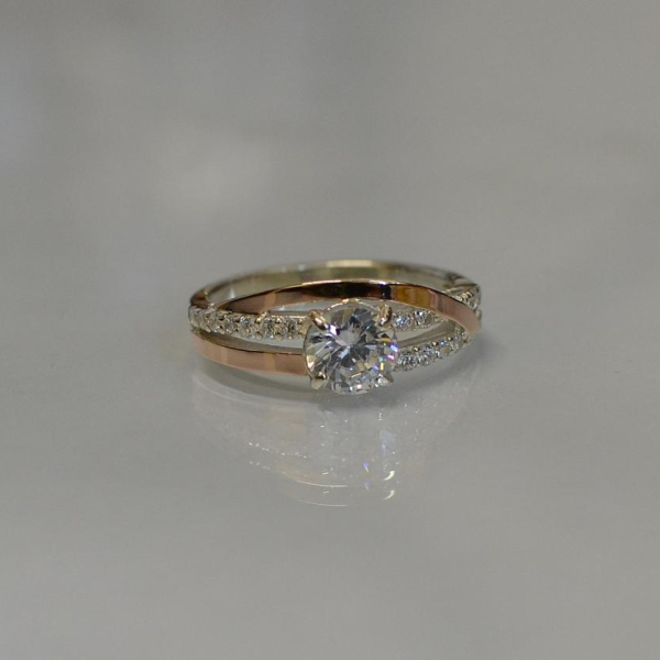 Срібне кільце з золотими вставками