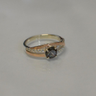 Срібне кільце з золотими вставками