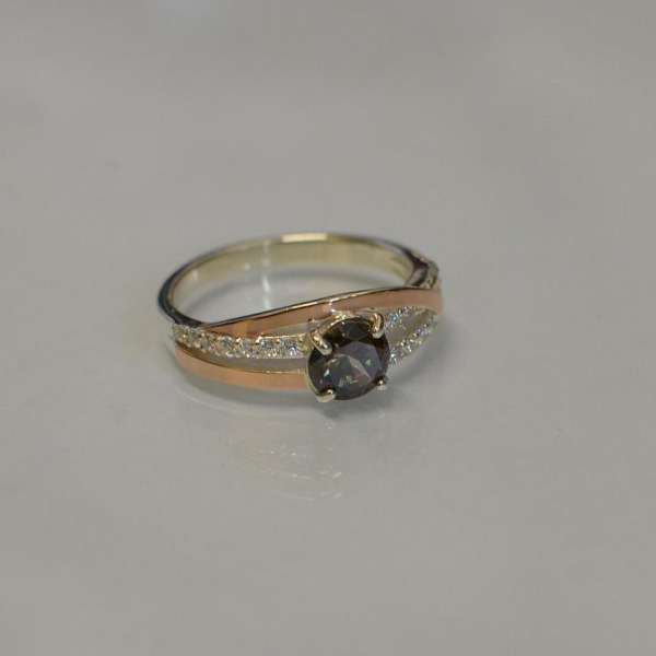 Срібне кільце з золотими вставками