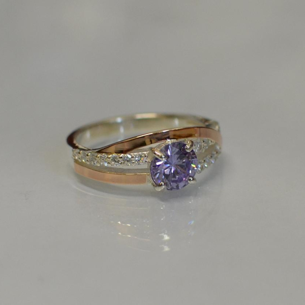 Срібне кільце з золотими вставками