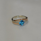 Срібне кільце з золотими вставками