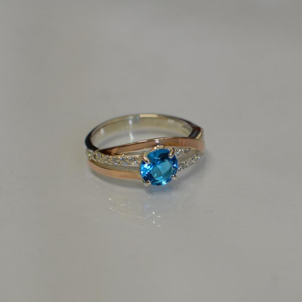 Срібне кільце з золотими вставками