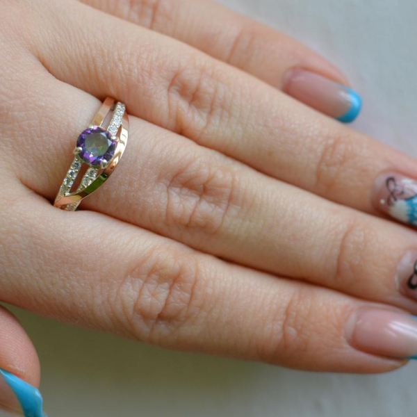 Срібне кільце з золотими вставками