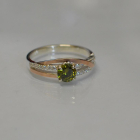 Срібне кільце з золотими вставками