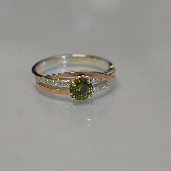 Срібне кільце з золотими вставками