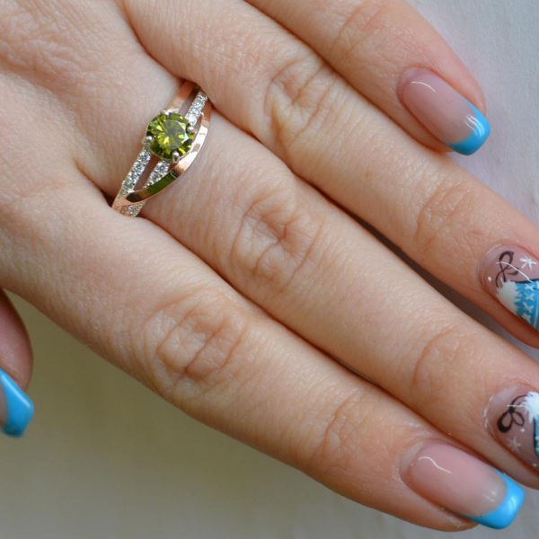 Срібне кільце з золотими вставками