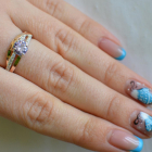 Срібне кільце з золотими вставками