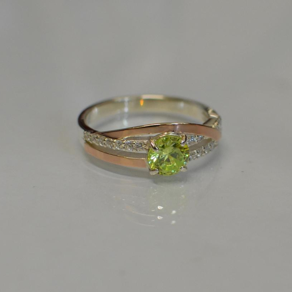 Срібне кільце з золотими вставками