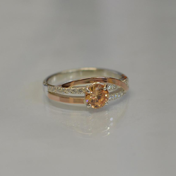 Срібне кільце з золотими вставками