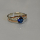 Срібне кільце з золотими вставками