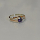 Срібне кільце з золотими вставками