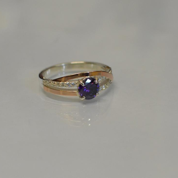 Срібне кільце з золотими вставками