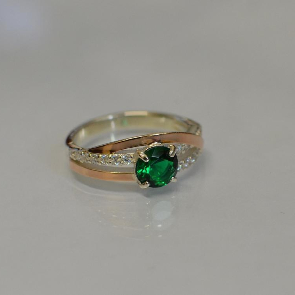 Срібне кільце з золотими вставками